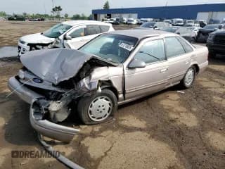 ✅ 1994 Ford Taurus GL • VIN: 1FALP52U7RG235494 • Lot: 61218665. Listed on Copart with 69,408 mi. Free auction sales archive from the USA and detailed vehicle history report at DreamBid. Image 1.