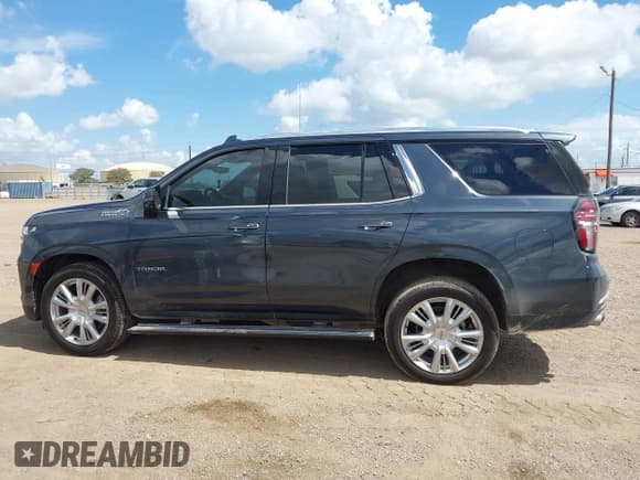 ✅ 2021 Chevrolet Tahoe High Country • VIN: 1GNSCTKL2MR110503 • Лот: 42928162. Опубликован ранее на IAAI с пробегом 81 564 миль. Бесплатный доступ к архиву аукционных продаж из США и подробный отчёт об истории автомобиля на DreamBid. Изображение 14.