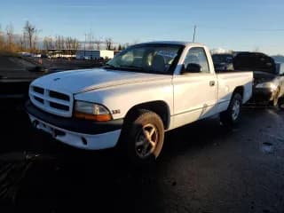 ✅ 1999 Dodge Dakota SLT • VIN: 1B7FL26X6XS142370 • Lot: 84569414. Wystawiony na Copart z przebiegiem 154 902 mil. Bezpłatny archiwum sprzedaży aukcyjnych z USA i szczegółowy raport historii pojazdu na DreamBid. Zdjęcie 1.
