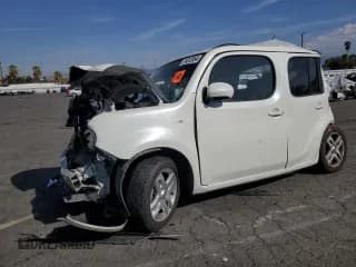 ✅ 2010 Nissan Cube S • VIN: JN8AZ2KR9AT151683 • Lot: 74812854. Wystawiony na Copart z przebiegiem 152 014 mil. Bezpłatny archiwum sprzedaży aukcyjnych z USA i szczegółowy raport historii pojazdu na DreamBid. Zdjęcie 1.