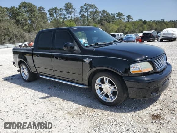 ✅ 2003 Ford F-150 Harley-Davidson • VIN: 1FTRW07383KD62463 • Lot: 49995655. Listed on Copart with 131,683 mi. Free auction sales archive from the USA and detailed vehicle history report at DreamBid. Image 4.