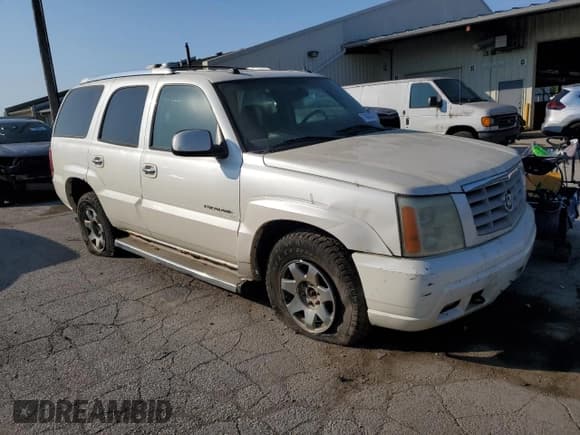 ✅ 2005 Cadillac Escalade • VIN: 1GYEK63NX5R140791 • Lot: 71642454. Wystawiony na Copart z przebiegiem 174 025 mil. Bezpłatny archiwum sprzedaży aukcyjnych z USA i szczegółowy raport historii pojazdu na DreamBid. Zdjęcie 4.