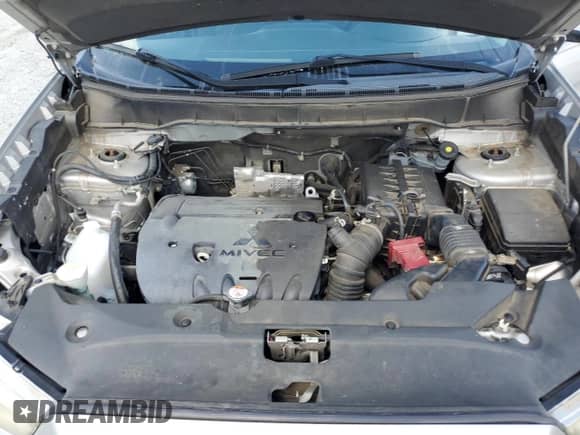 2014 Mitsubishi Outlander ES z VIN 4A4AP3AU5EE004583, wystawiony jako Copart lot #70437975 z przebiegiem 188 724 mil mil oraz Szkoda całkowita • Salvage title. Historia ofert i sprzedaży dostępna na DreamBid. Obrazek 12.