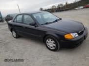 ✅ 1999 Mazda Protege DX • VIN: JM1BJ222XX0132130 • Лот: 87385205. Опубликован ранее на Copart с пробегом 47 948 миль. Бесплатный доступ к архиву аукционных продаж из США и подробный отчёт об истории автомобиля на DreamBid. Изображение 4.