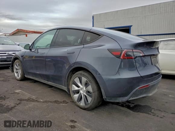 ✅ 2023 Tesla Model Y Long Range • VIN: 7SAYGDEE3PF714262 • Lot: 94197075. Wystawiony na Copart z przebiegiem 13 670 mil. Bezpłatny archiwum sprzedaży aukcyjnych z USA i szczegółowy raport historii pojazdu na DreamBid. Zdjęcie 2.