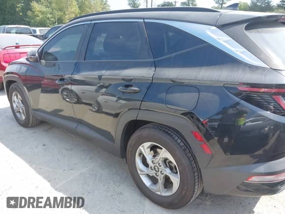2022 Hyundai Tucson SEL with VIN 5NMJB3AE6NH114845, listed as a IAAI auction lot 43198692 with 38,872 mi miles and . Bid and sale history available at DreamBid. Image 14.