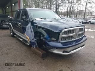 ✅ 2012 Ram 1500 Laramie • VIN: 1C6RD6NT7CS216557 • Lot: 41809228. Listed on IAAI with 173,133 mi. Free auction sales archive from the USA and detailed vehicle history report at DreamBid. Image 1.