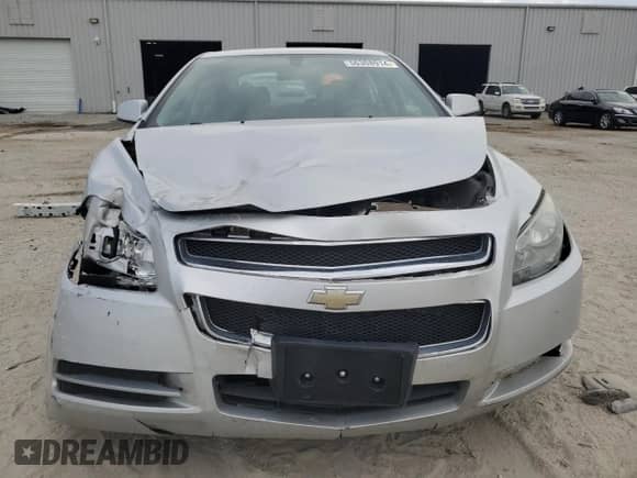 2010 Chevrolet Malibu 1LT z VIN 1G1ZC5E07AF323909, wystawiony jako Copart lot #56308914 z przebiegiem 169 154 mil mil oraz Szkoda całkowita • Salvage title. Historia ofert i sprzedaży dostępna na DreamBid. Obrazek 5.