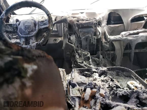 2009 Dodge 1500 SLT с VIN 1D3HV13P19J528745, выставлен на аукционе Copart как лот 66765464 с пробегом Не указан миль и Списание • Salvage title. История ставок и продаж доступна на DreamBid. Изображение 8.