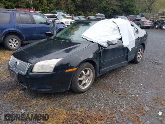 ✅ 2006 Mercury Milan • VIN: 3MEFM07Z06R629378 • Lot: 42087954. Listed on IAAI with 84,404 mi. Free auction sales archive from the USA and detailed vehicle history report at DreamBid. Image 17.