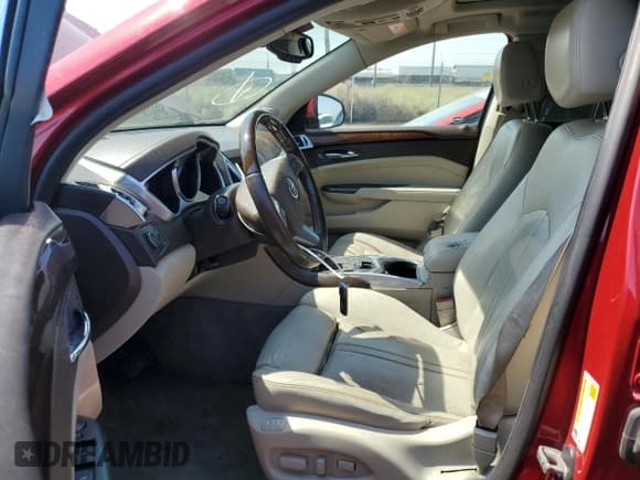 ✅ 2012 Cadillac SRX Premium Collection • VIN: 3GYFNFE32CS656032 • Lot: 70530055. Wystawiony na Copart z przebiegiem 53 556 mil. Bezpłatny archiwum sprzedaży aukcyjnych z USA i szczegółowy raport historii pojazdu na DreamBid. Zdjęcie 7.