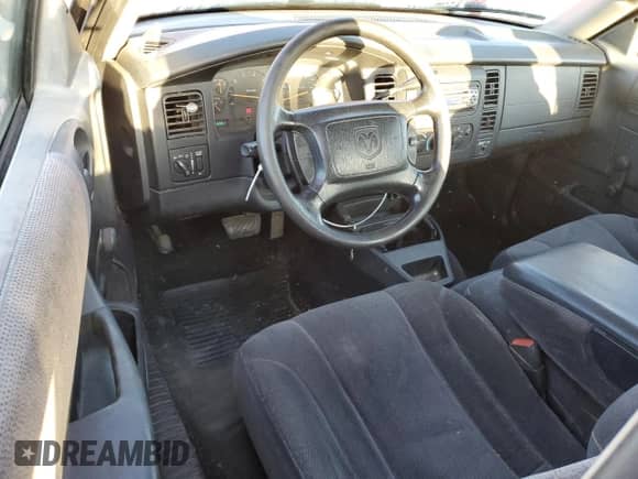 2002 Dodge Dakota SLT с VIN 1B7GL42N72S500329, выставлен на аукционе Copart как лот 75703164 с пробегом 159 391 миль миль и Списание • Salvage title. История ставок и продаж доступна на DreamBid. Изображение 8.