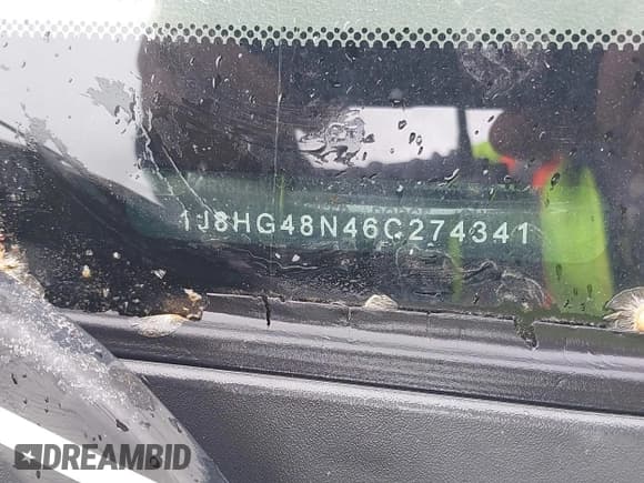 ✅ 2006 Jeep Commander • VIN: 1J8HG48N46C274341 • Lot: 42264428. Listed on IAAI with 153,443 mi. Free auction sales archive from the USA and detailed vehicle history report at DreamBid. Image 9.