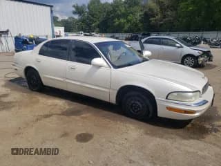 ✅ 2004 Buick Park Avenue • VIN: 1G4CW54K144140136 • Lot: 71315704. Listed on Copart with 215,069 mi. Free auction sales archive from the USA and detailed vehicle history report at DreamBid. Image 4.
