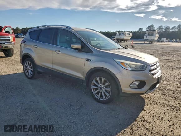 ✅ 2017 Ford Escape Titanium • VIN: 1FMCU0JD7HUB86512 • Lot: 96520485. Wystawiony na Copart z przebiegiem 202 165 mil. Bezpłatny archiwum sprzedaży aukcyjnych z USA i szczegółowy raport historii pojazdu na DreamBid. Zdjęcie 4.