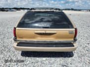 ✅ 1996 Buick Roadmaster Estate Collectors Edition • VIN: 1G4BR82P3TR415414 • Lot: 67954115. Wystawiony na Copart z przebiegiem 57 516 mil. Bezpłatny archiwum sprzedaży aukcyjnych z USA i szczegółowy raport historii pojazdu na DreamBid. Zdjęcie 6.