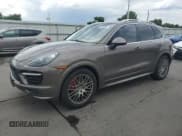 ✅ 2014 Porsche Cayenne GTS • VIN: WP1AD2A25ELA77262 • Lot: 65582005. Wystawiony na Copart z przebiegiem 50 576 mil. Bezpłatny archiwum sprzedaży aukcyjnych z USA i szczegółowy raport historii pojazdu na DreamBid. Zdjęcie 1.