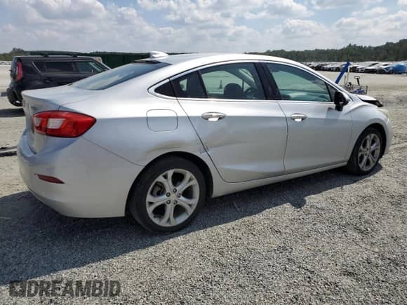 2016 Chevrolet Cruze Premier with VIN 1G1BG5SM0G7269465, listed as a Copart auction lot 82115635 with 143,928 mi miles and Salvage title. Bid and sale history available at DreamBid. Image 3.