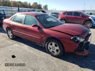 ✅ 2002 Ford Taurus SEL Deluxe • VIN: 1FAHP56S52A190899 • Lot: 91326005. Listed on Copart with 131,094 mi. Free auction sales archive from the USA and detailed vehicle history report at DreamBid. Image 4.