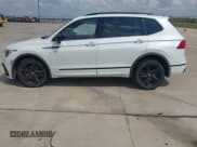 ✅ 2023 Volkswagen Tiguan SE R-Line Black • VIN: 3VVCB7AX3PM048922 • Lot: 43262407. Listed on IAAI with 48,966 mi. Free auction sales archive from the USA and detailed vehicle history report at DreamBid. Image 14.