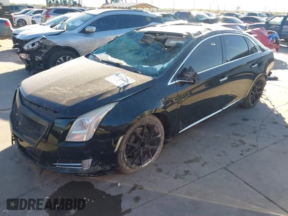 ✅ 2014 Cadillac XTS Luxury • VIN: 2G61M5S35E9168570 • Lot: 42495684. Listed on IAAI with 207,831 mi. Free auction sales archive from the USA and detailed vehicle history report at DreamBid. Image 2.