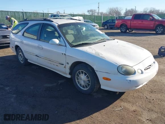 ✅ 1999 Ford Taurus SE • VIN: 1FAFP58SXXG191894 • Lot: 41628348. Listed on IAAI with 168,299 mi. Free auction sales archive from the USA and detailed vehicle history report at DreamBid. Image 1.