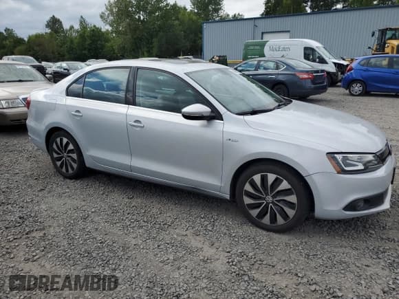 ✅ 2013 Volkswagen Jetta Hybrid SE • VIN: 3VW637AJ4DM275873 • Lot: 63086325. Listed on Copart with 112,143 mi. Free auction sales archive from the USA and detailed vehicle history report at DreamBid. Image 4.