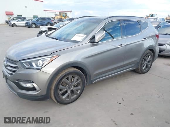 ✅ 2017 Hyundai Santa Fe Ultimate • VIN: 5XYZW4LA7HG399397 • Lot: 43350982. Wystawiony na IAAI z przebiegiem 138 307 mil. Bezpłatny archiwum sprzedaży aukcyjnych z USA i szczegółowy raport historii pojazdu na DreamBid. Zdjęcie 17.