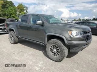 ✅ 2017 Chevrolet Colorado 4WD ZR2 • VIN: 1GCGTEEN0H1311246 • Лот: 72078584. Опубликован ранее на Copart с пробегом 119 678 миль. Бесплатный доступ к архиву аукционных продаж из США и подробный отчёт об истории автомобиля на DreamBid. Изображение 4.
