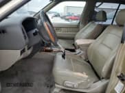 ✅ 2002 Infiniti QX4 Luxury • VIN: JNRDR09Y42W257288 • Лот: 84765564. Опубликован ранее на Copart с пробегом 250 388 миль. Бесплатный доступ к архиву аукционных продаж из США и подробный отчёт об истории автомобиля на DreamBid. Изображение 7.