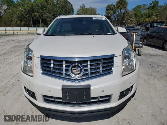 ✅ 2014 Cadillac SRX Performance Collection • VIN: 3GYFNCE30ES643443 • Lot: 78481064. Listed on Copart with 106,657 mi. Free auction sales archive from the USA and detailed vehicle history report at DreamBid. Image 5.