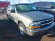 1999 Chevrolet Blazer LT z VIN 1GNDT13W9X2186755, wystawiony jako IAAI lot #41865171 z przebiegiem 107 191 mil mil oraz . Historia ofert i sprzedaży dostępna na DreamBid. Obrazek 1.