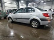 ✅ 2007 Kia Rio LX • VIN: KNADE123376246349 • Lot: 87293694. Listed on Copart with 181,361 mi. Free auction sales archive from the USA and detailed vehicle history report at DreamBid. Image 2.