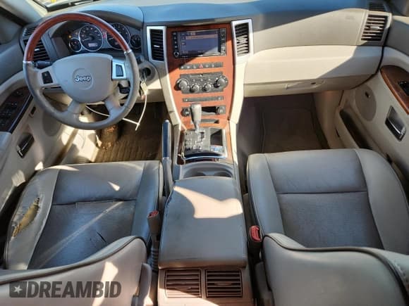 ✅ 2009 Jeep Grand Cherokee • VIN: 1J8HR68T69C520847 • Lot: 89548155. Listed on Copart with 322,340 mi. Free auction sales archive from the USA and detailed vehicle history report at DreamBid. Image 8.
