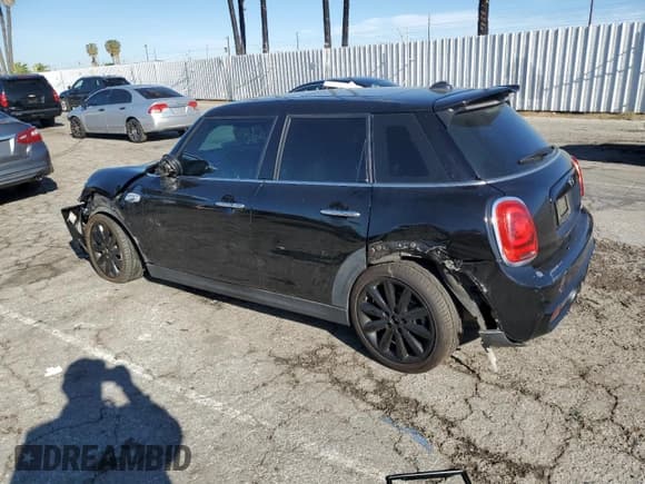 ✅ 2015 MINI Hardtop 4 Door S • VIN: WMWXU3C53F2B55859 • Lot: 48332415. Listed on Copart with 50,932 mi. Free auction sales archive from the USA and detailed vehicle history report at DreamBid. Image 2.