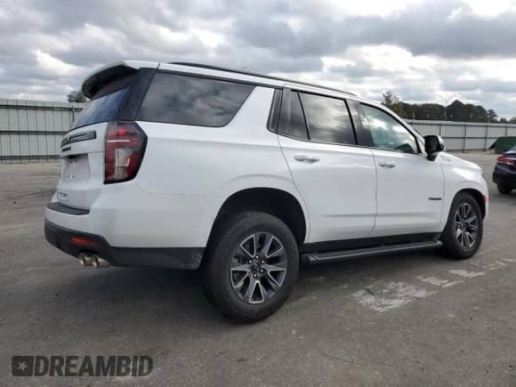 2024 Chevrolet Tahoe Z71 with VIN 1GNSKPKLXRR128006, listed as a Copart auction lot 79812694 with 24,199 mi miles and Salvage title. Bid and sale history available at DreamBid. Image 3.