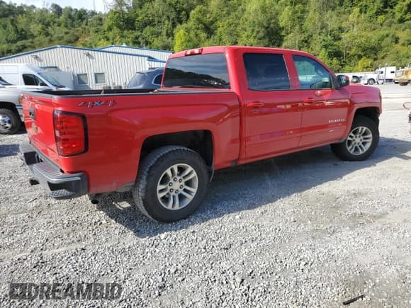 ✅ 2018 Chevrolet Silverado 1500 LT • VIN: 3GCUKREC7JG624958 • Лот: 69591604. Опубликован ранее на Copart с пробегом 141 439 миль. Бесплатный доступ к архиву аукционных продаж из США и подробный отчёт об истории автомобиля на DreamBid. Изображение 3.