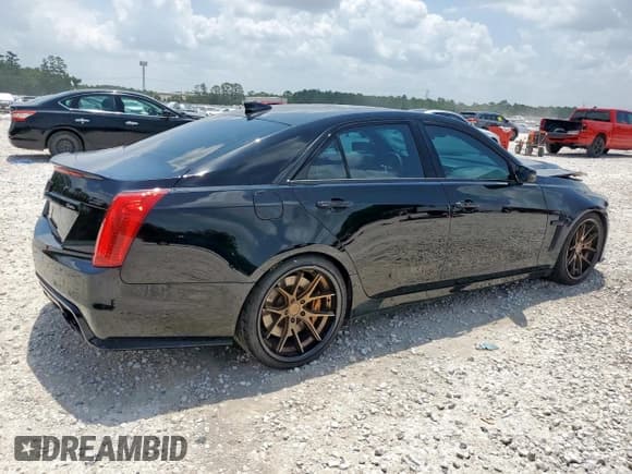 ✅ 2016 Cadillac CTS-V • VIN: 1G6A15S66G0194322 • Lot: 58765305. Listed on Copart with 62,725 mi. Free auction sales archive from the USA and detailed vehicle history report at DreamBid. Image 3.