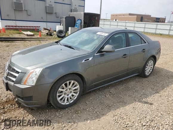 ✅ 2011 Cadillac CTS • VIN: 1G6DC5EY7B0156563 • Lot: 71488765. Listed on Copart with 124,236 mi. Free auction sales archive from the USA and detailed vehicle history report at DreamBid. Image 1.