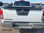 ✅ 2015 Nissan Frontier S • VIN: 1N6BD0CT6FN742267 • Lot: 43672468. Listed on IAAI with 128,428 mi. Free auction sales archive from the USA and detailed vehicle history report at DreamBid. Image 16.