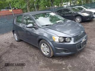 2012 Chevrolet Sonic LT z VIN 1G1JD6SH2C4188184, wystawiony jako IAAI lot #42388650 z przebiegiem 160 000 mil mil oraz . Historia ofert i sprzedaży dostępna na DreamBid. Obrazek 1.