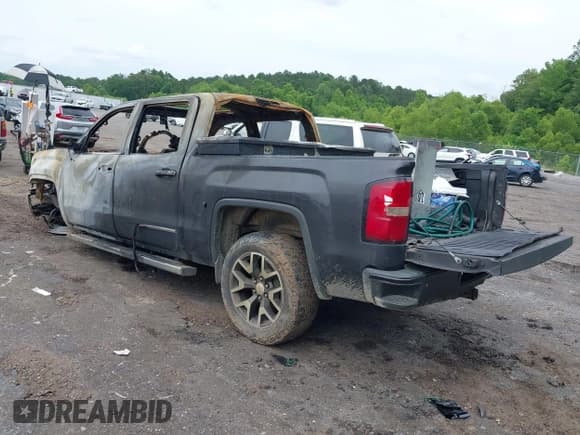 ✅ 2015 GMC Sierra 1500 SLT • VIN: 3GTU2VEC2FG127896 • Lot: 42345849. Listed on IAAI with Not provided. Free auction sales archive from the USA and detailed vehicle history report at DreamBid. Image 3.