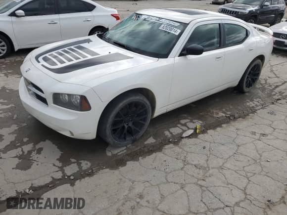 2009 Dodge Charger SXT с VIN 2B3KA33V69H576152, выставлен на аукционе Copart как лот 82020014 с пробегом 129 304 миль миль и Списание • Salvage title. История ставок и продаж доступна на DreamBid. Изображение 1.