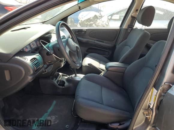 2005 Dodge Neon SXT z VIN 1B3ES56C95D201704, wystawiony jako Copart lot #59340935 z przebiegiem 119 066 mil mil oraz Szkoda całkowita • Salvage title. Historia ofert i sprzedaży dostępna na DreamBid. Obrazek 7.