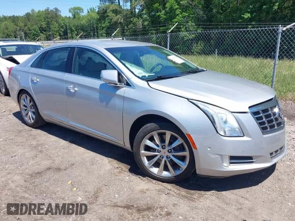 ✅ 2014 Cadillac XTS Luxury • VIN: 2G61M5S31E9199170 • Lot: 42150000. Listed on IAAI with 135,414 mi. Free auction sales archive from the USA and detailed vehicle history report at DreamBid. Image 1.