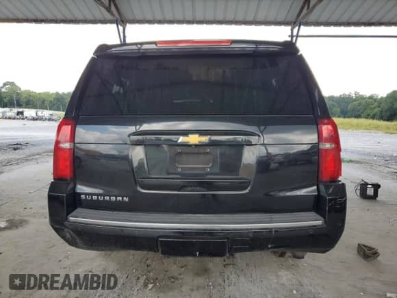 2015 Chevrolet Suburban LTZ with VIN 1GNSKKKC6FR552331, listed as a Copart auction lot 67313905 with 275,958 mi miles and Salvage title. Bid and sale history available at DreamBid. Image 6.