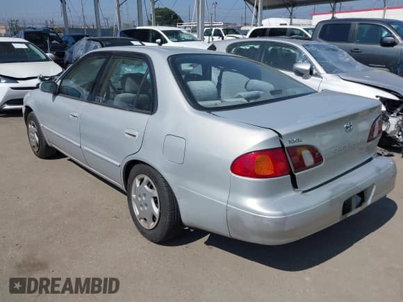 ✅ 2000 Toyota Corolla VE • VIN: 1NXBR12E9YZ356086 • Lot: 42510317. Listed on IAAI with 122,607 mi. Free auction sales archive from the USA and detailed vehicle history report at DreamBid. Image 3.