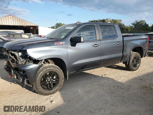✅ 2021 Chevrolet Silverado 1500 Custom Trail Boss • VIN: 1GCPYCEF1MZ449324 • Lot: 73516854. Wystawiony na Copart z przebiegiem 78 074 mil. Bezpłatny archiwum sprzedaży aukcyjnych z USA i szczegółowy raport historii pojazdu na DreamBid. Zdjęcie 1.