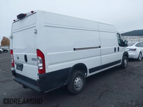 ✅ 2023 Ram ProMaster Cargo • VIN: 3C6MRVJG0PE571061 • Lot: 43703247. Listed on IAAI with 17,462 mi. Free auction sales archive from the USA and detailed vehicle history report at DreamBid. Image 4.