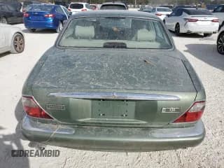 ✅ 1999 Jaguar XJ • VIN: SAJHD1043XC869413 • Лот: 76940624. Опубликован ранее на Copart с пробегом Не указан. Бесплатный доступ к архиву аукционных продаж из США и подробный отчёт об истории автомобиля на DreamBid. Изображение 6.